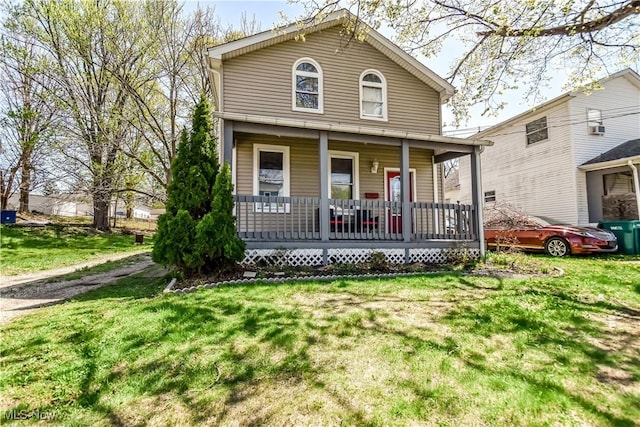 37 S Cedar St, Geneva, OH 44041 - view of front of house with a porch and a front yard