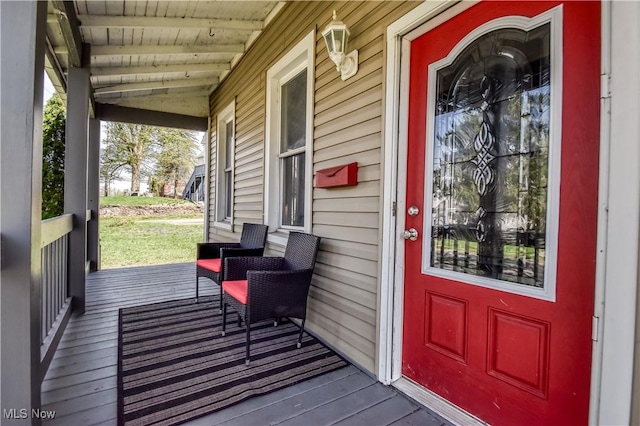 37 S Cedar St, Geneva, OH 44041 - view of exterior entry featuring a porch
