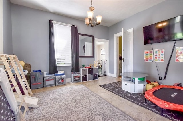 37 S Cedar St, Geneva, OH 44041 - rec room featuring a chandelier and tile patterned flooring