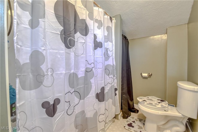37 S Cedar St, Geneva, OH 44041 - full bathroom with a textured ceiling and tile patterned floors