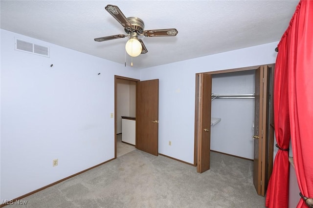 26788 Skyline Dr, Olmsted Twp, OH 44138 - unfurnished bedroom with light carpet, a closet, and ceiling fan