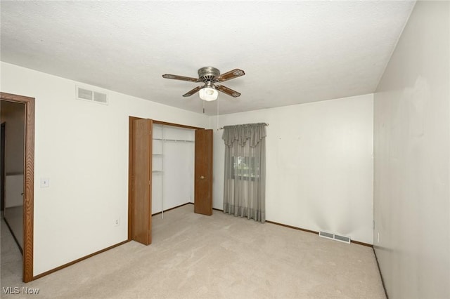 26788 Skyline Dr, Olmsted Twp, OH 44138 - unfurnished bedroom with a closet, light colored carpet, and ceiling fan