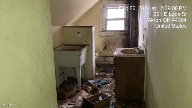 221 E Lods St, Akron, OH 44304 - bathroom featuring vanity and vaulted ceiling