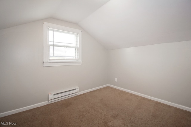 105 Tudor Ave, Bedford, OH 44146 - additional living space with a baseboard radiator, lofted ceiling, and carpet