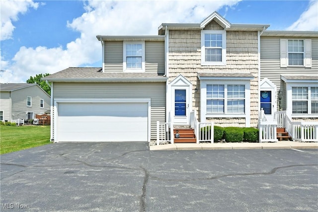 3189 Woodland Trl Unit A, Cortland, OH 44410 - view of front of house featuring asphalt driveway