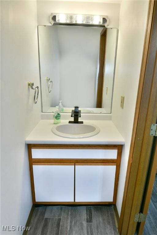3189 Woodland Trl Unit A, Cortland, OH 44410 - bathroom with vanity and wood finished floors