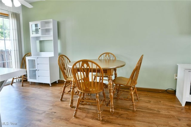 3189 Woodland Trl Unit A, Cortland, OH 44410 - dining area featuring wood finished floors and ceiling fan