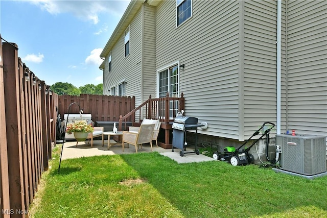 3189 Woodland Trl Unit A, Cortland, OH 44410 - fenced backyard featuring a patio and an outdoor living space