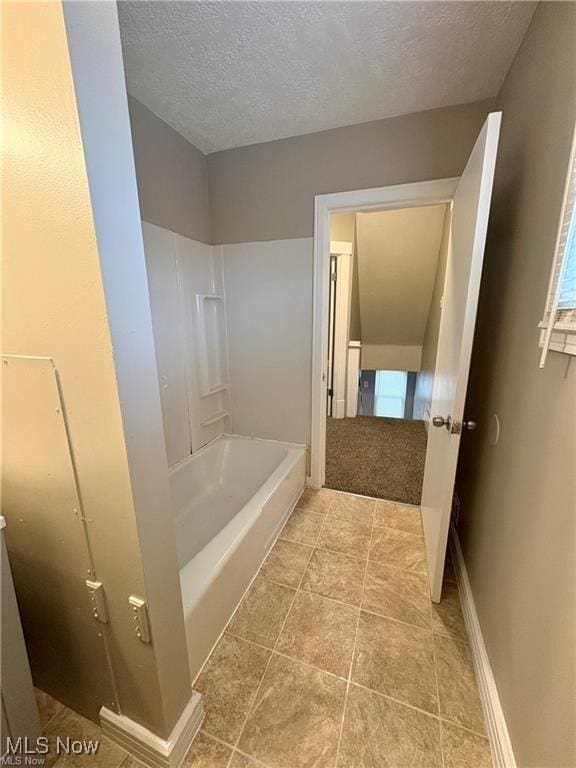 309 Emma St, Niles, OH 44446 - bathroom with a textured ceiling and baseboards