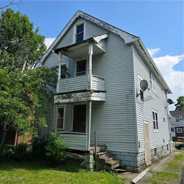 13013 Soika Ave, Cleveland, OH 44120 - back of house featuring a balcony