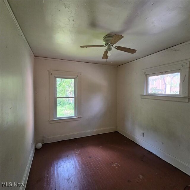 13013 Soika Ave, Cleveland, OH 44120 - spare room featuring wood-type flooring and a ceiling fan