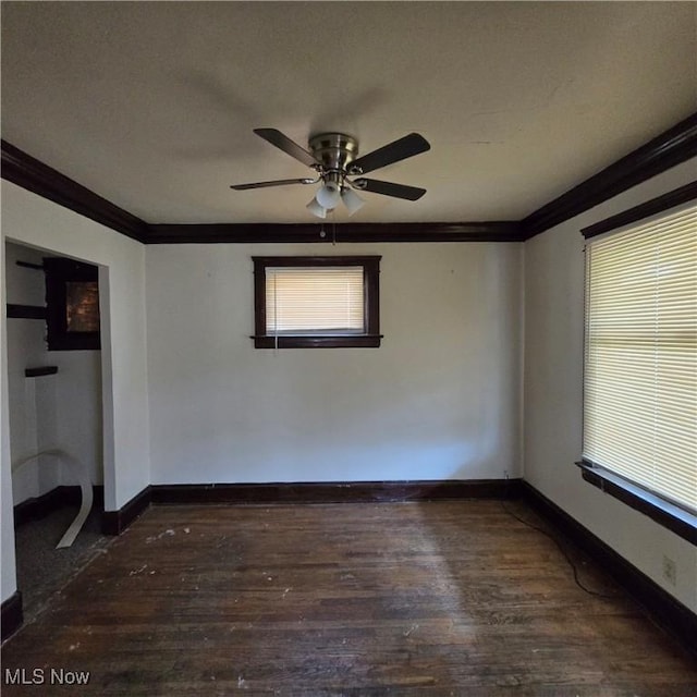 13013 Soika Ave, Cleveland, OH 44120 - spare room with crown molding, a ceiling fan, and wood finished floors