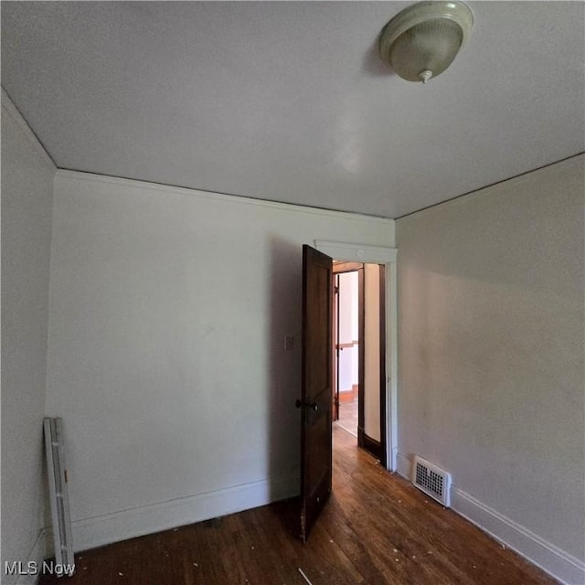 13013 Soika Ave, Cleveland, OH 44120 - empty room featuring wood finished floors and baseboards