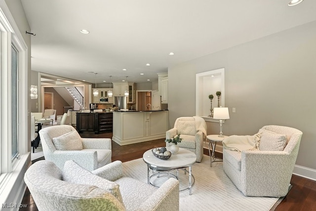 3880 Waterford Ct, Orange, OH 44122 - living room featuring wood finished floors, stairs, and recessed lighting