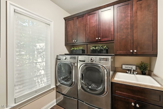 3880 Waterford Ct, Orange, OH 44122 - washroom with cabinet space and washer and clothes dryer