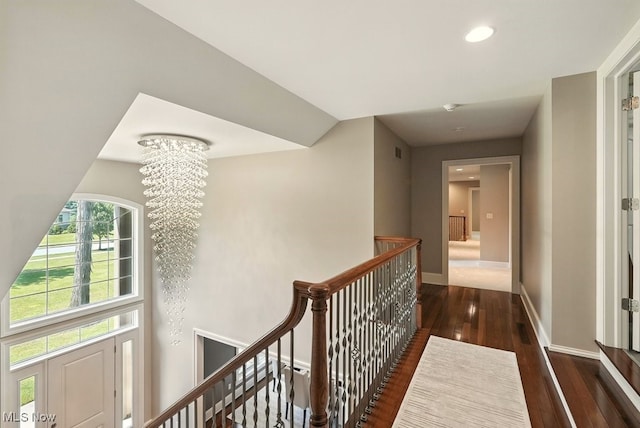 3880 Waterford Ct, Orange, OH 44122 - hallway with an upstairs landing, a chandelier, wood-type flooring, and recessed lighting