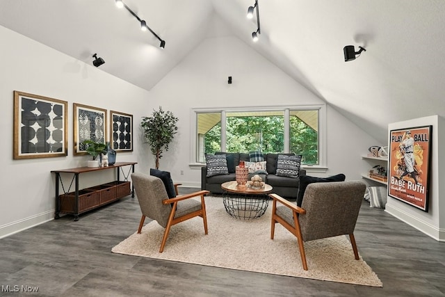 3880 Waterford Ct, Orange, OH 44122 - living area featuring track lighting, lofted ceiling, and dark wood finished floors