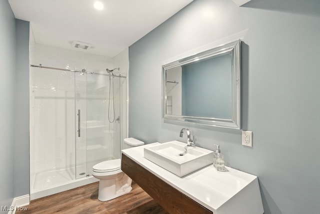 3880 Waterford Ct, Orange, OH 44122 - full bathroom featuring a shower stall, wood finished floors, and vanity