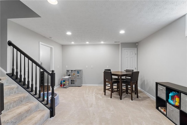 7605 Diamondback Ave NW, Canal Fulton, OH 44614 - dining room with recessed lighting, light carpet, and stairs