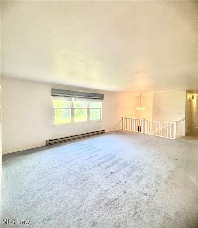 1104 Lantern, East Liverpool, OH 43920 - unfurnished room featuring a baseboard radiator and carpet