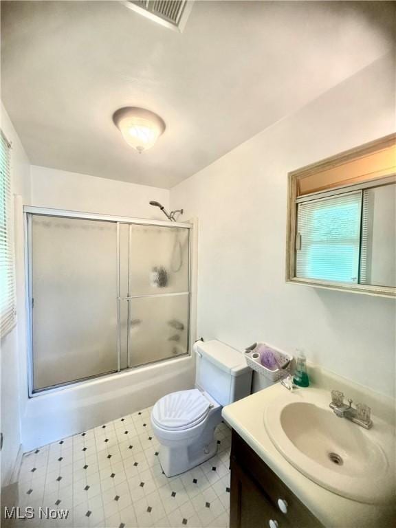 1104 Lantern, East Liverpool, OH 43920 - full bathroom with vanity, shower / bath combination with glass door, and tile patterned floors