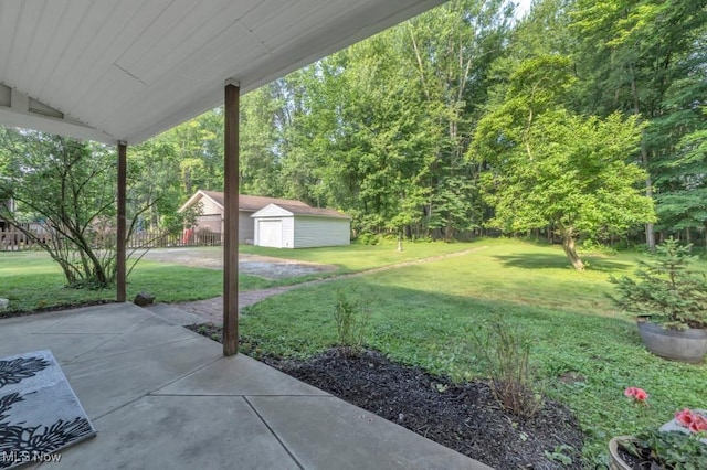 4706 Lansing Dr, North Olmsted, OH 44070 - view of grassy yard featuring a patio area and a storage shed