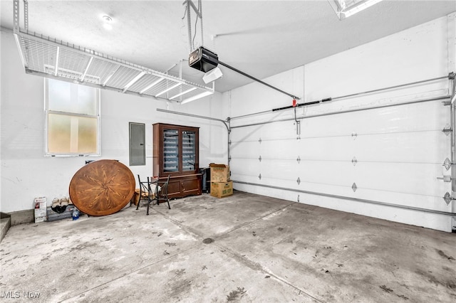 11901 Detroit Ave, Lakewood, OH 44107 - garage with a garage door opener and electric panel