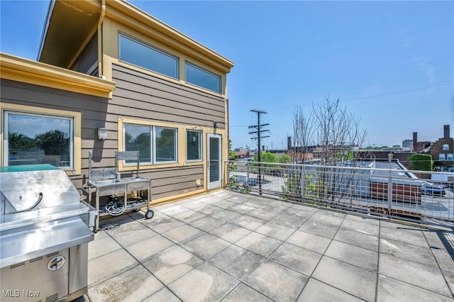 11901 Detroit Ave, Lakewood, OH 44107 - view of patio with a grill