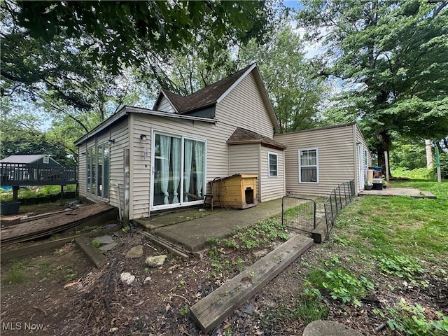 604 Pear Dr, Akron, OH 44319 - back of property with a patio area