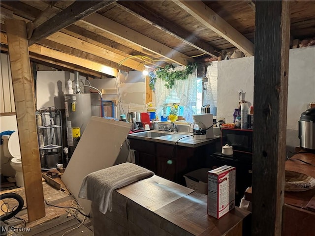 604 Pear Dr, Akron, OH 44319 - basement with a sink and water heater