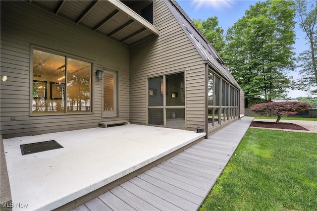 263 E Pne Lake Rd, North Lima, OH 44452 - wooden deck with a patio area, a lawn, and a sunroom