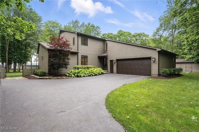 263 E Pne Lake Rd, North Lima, OH 44452 - mid-century modern home with driveway and a garage