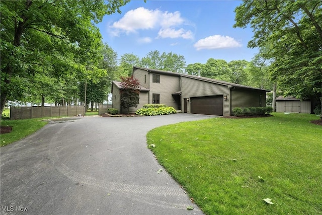 263 E Pne Lake Rd, North Lima, OH 44452 - view of front of property featuring asphalt driveway and an attached garage