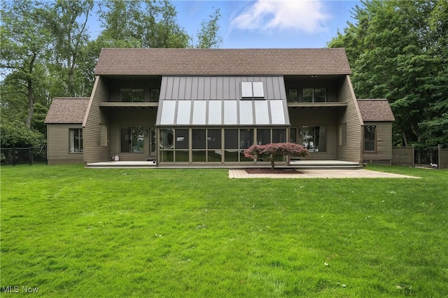 263 E Pne Lake Rd, North Lima, OH 44452 - back of property with a shingled roof and a patio