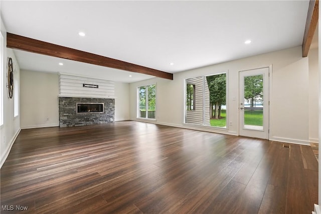 263 E Pne Lake Rd, North Lima, OH 44452 - unfurnished living room featuring beamed ceiling, dark wood-style floors, a fireplace, and recessed lighting