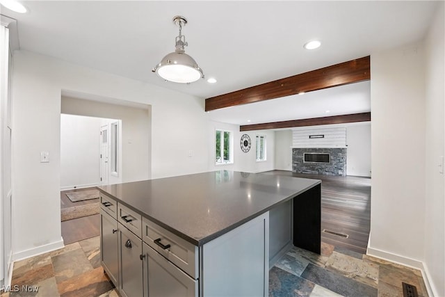 263 E Pne Lake Rd, North Lima, OH 44452 - kitchen featuring dark countertops, a center island, recessed lighting, beam ceiling, and hanging light fixtures
