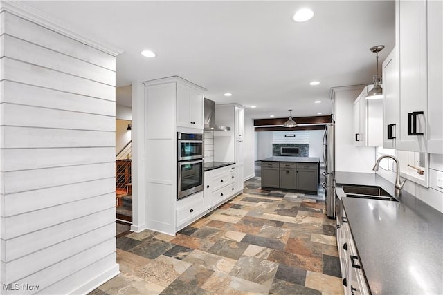 263 E Pne Lake Rd, North Lima, OH 44452 - kitchen with wall chimney exhaust hood, appliances with stainless steel finishes, dark countertops, recessed lighting, and gray cabinets