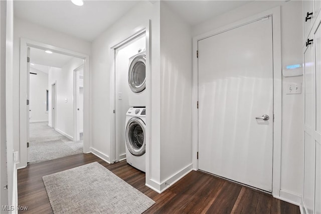 263 E Pne Lake Rd, North Lima, OH 44452 - washroom featuring stacked washing machine and dryer and dark wood finished floors