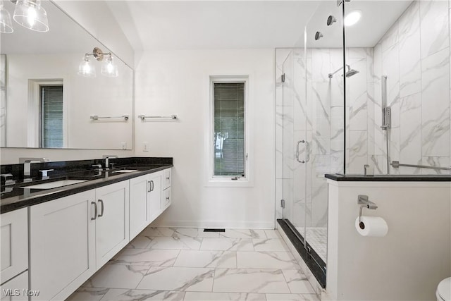 263 E Pne Lake Rd, North Lima, OH 44452 - full bath featuring marble look tiles, double vanity, and a marble finish shower