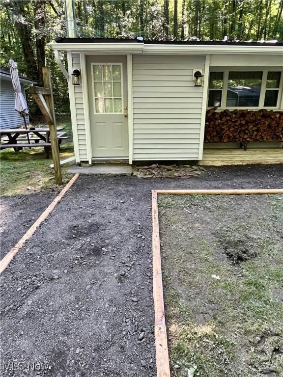 4807 Laskey Rd, Rome, OH 44085 - view of exterior entry featuring uncovered parking