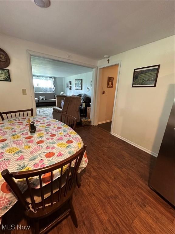 3028 Amsterdam Rd SE, Scio, OH 43988 - dining space with wood finished floors and baseboards