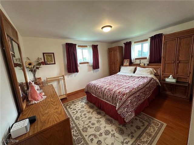 3028 Amsterdam Rd SE, Scio, OH 43988 - bedroom with multiple windows and wood finished floors
