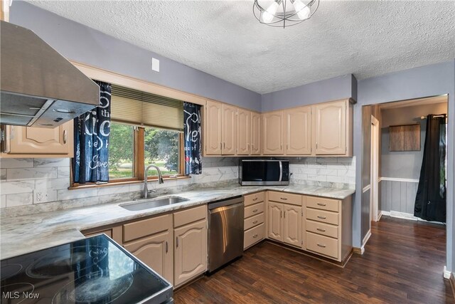 1558 Windcrest St NW, North Canton, OH 44720 - kitchen with stainless steel appliances, extractor fan, dark wood-type flooring, light countertops, and a textured ceiling