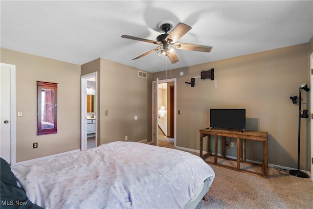 1558 Windcrest St NW, North Canton, OH 44720 - carpeted bedroom with baseboards and ceiling fan
