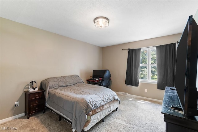 1558 Windcrest St NW, North Canton, OH 44720 - carpeted bedroom with baseboards