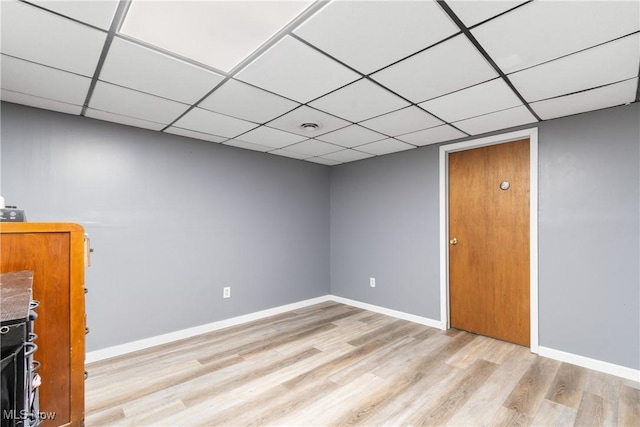 1558 Windcrest St NW, North Canton, OH 44720 - empty room featuring wood finished floors and a drop ceiling