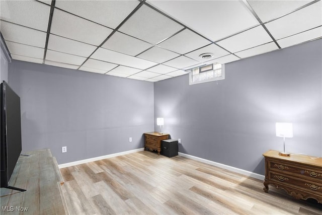 1558 Windcrest St NW, North Canton, OH 44720 - empty room featuring wood finished floors and a paneled ceiling