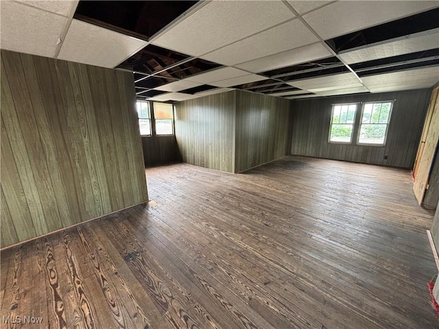 1709 Washington Blvd, Belpre, OH 45714 - spare room with wood-type flooring and wood walls