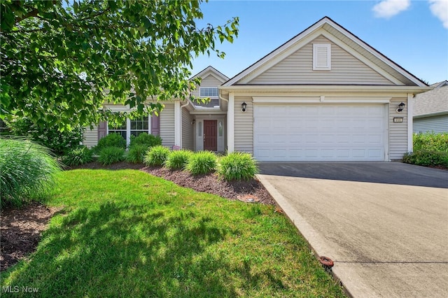 498 Water Pointe Ln, Brunswick, OH 44212 - view of front of house with concrete driveway, a garage, and a front yard