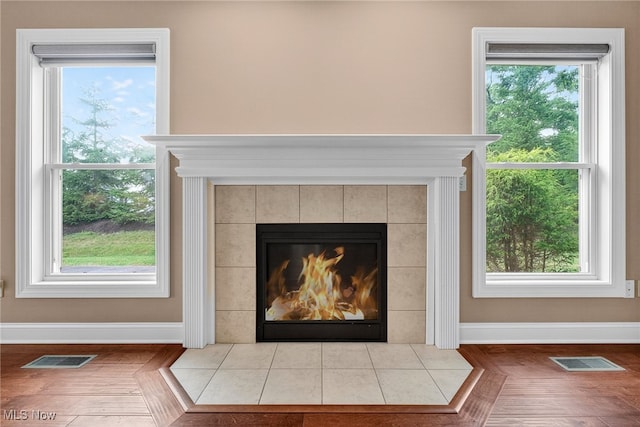 498 Water Pointe Ln, Brunswick, OH 44212 - detailed view of baseboards and a tile fireplace